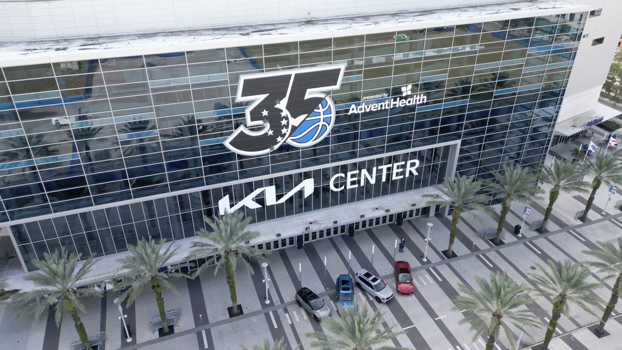 kia center drone shot with cars out front